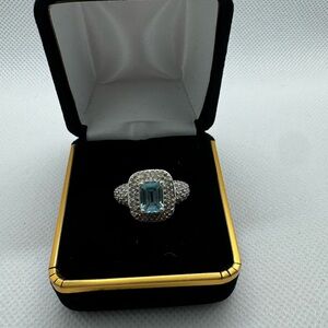 14 karat white gold, genuine, aquamarine, and genuine diamond ring